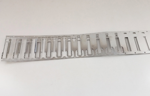 Part by progressive die